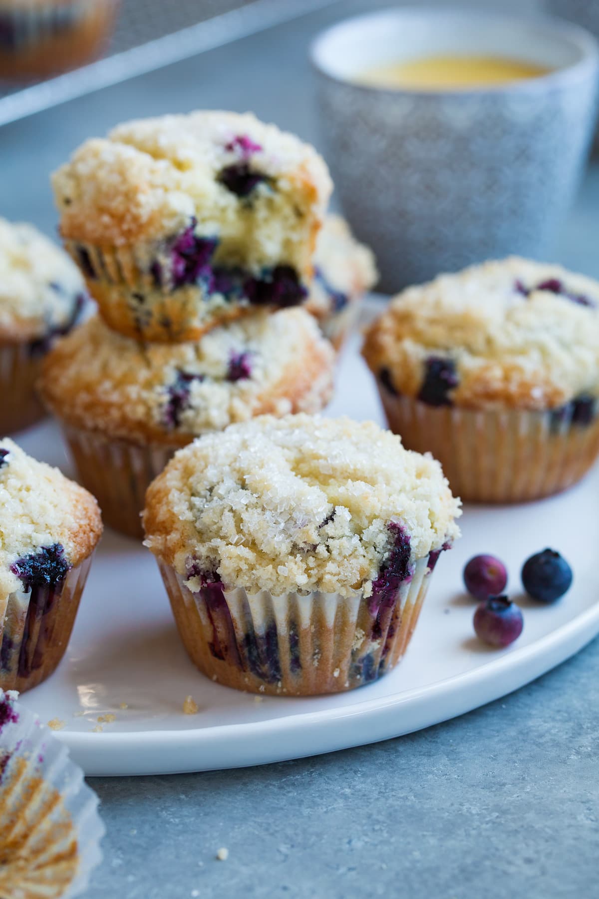Blueberry muffins showing crumb topping.