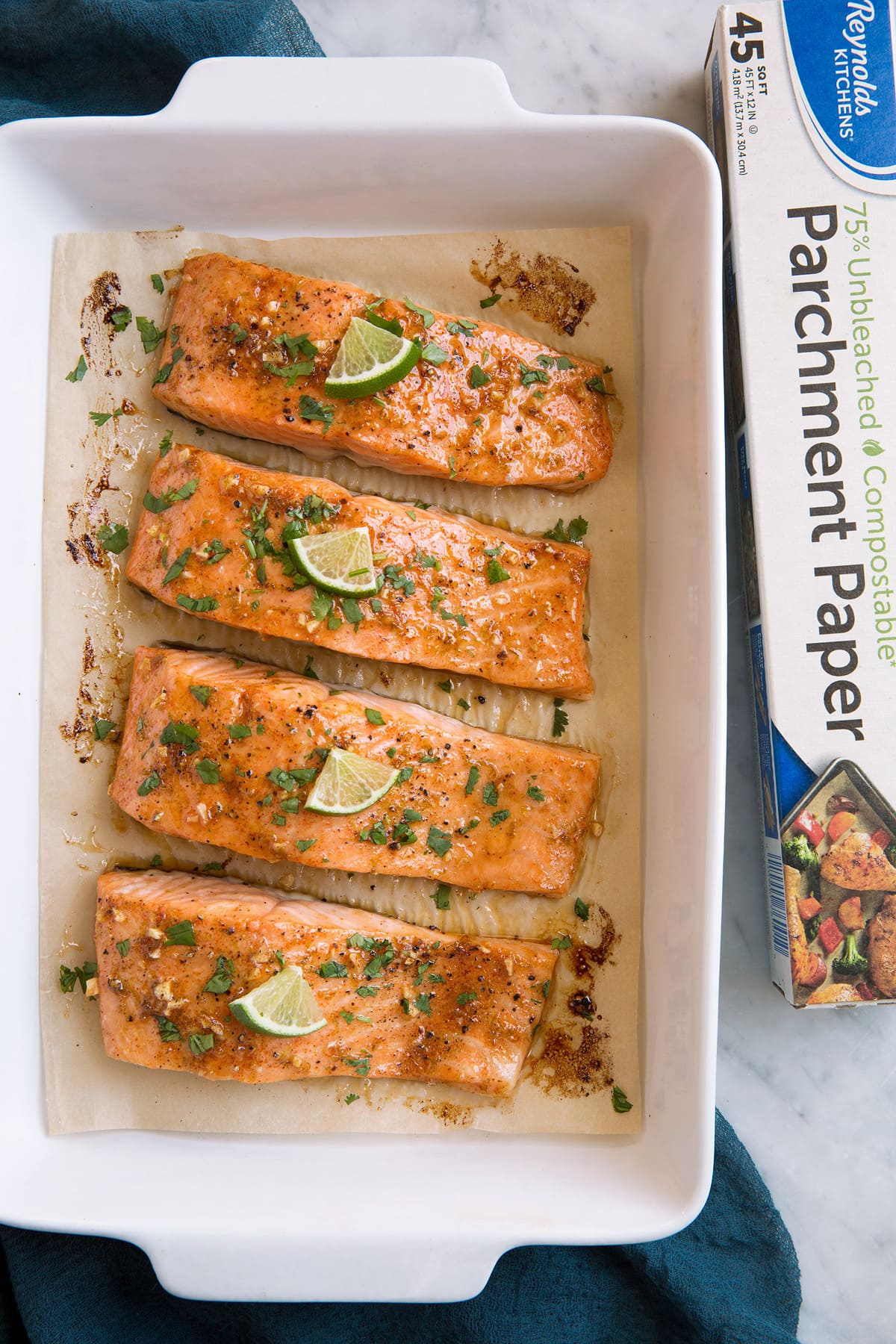 Overhead image of salmon fillets in a baking dish.