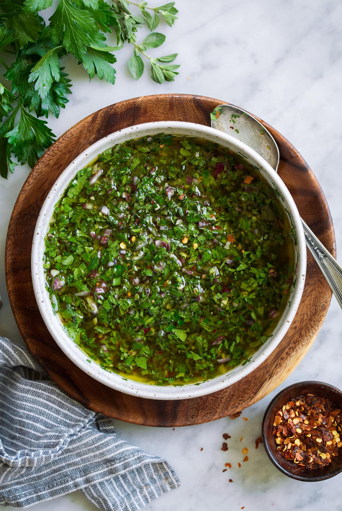 Overhead image of chimichurri in a bowl.