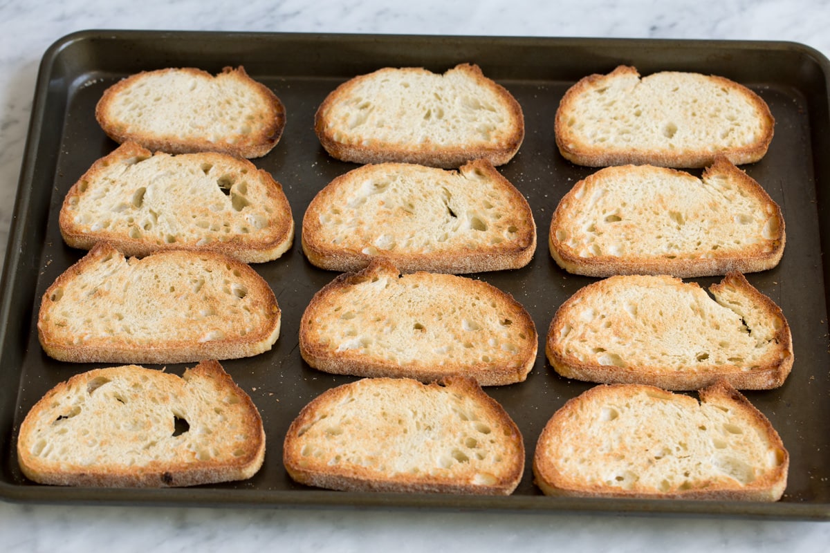 Toasted bread on a baking sheet