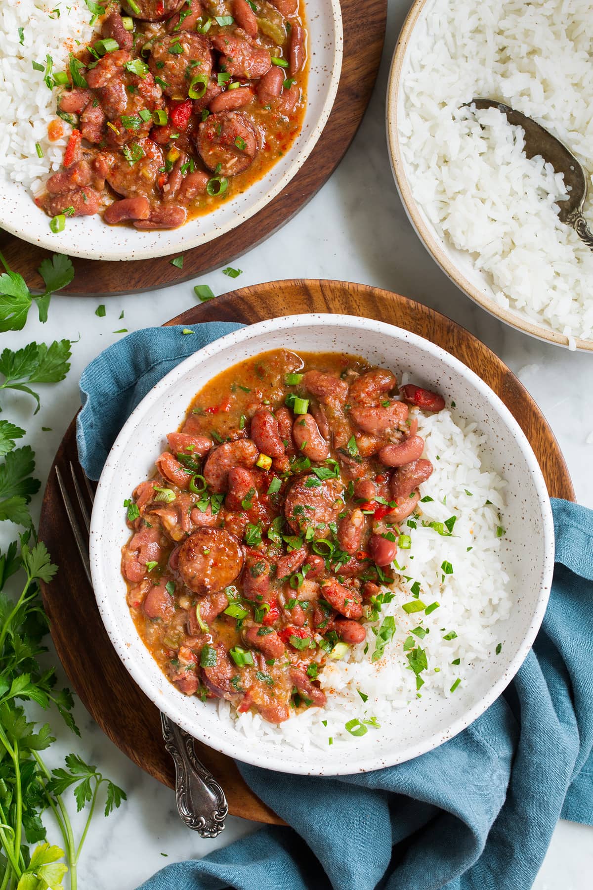 two servings of red beans and rice in bowls