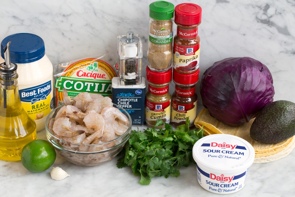 Ingredients needed to make shrimp tacos.