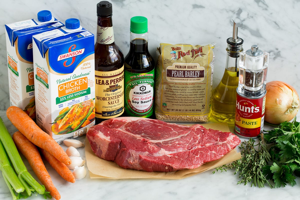 Ingredients that are used to make beef and barley soup.