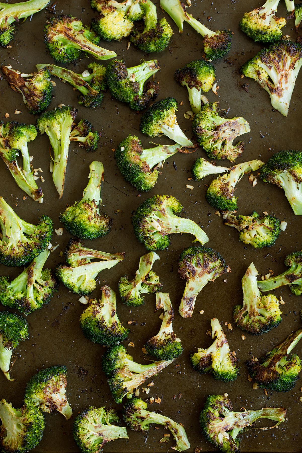 perfectly tender, deliciously browned and incredibly flavor. Broccoli goes from drab and bland to perfectly flavorful with this simple method. The best way to cook broccoli! Roasted broccoli florets after baking.
