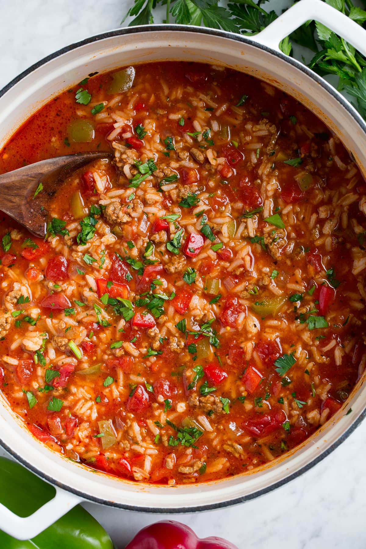 Overhead image of stuffed bell pepper soup in a large pot.