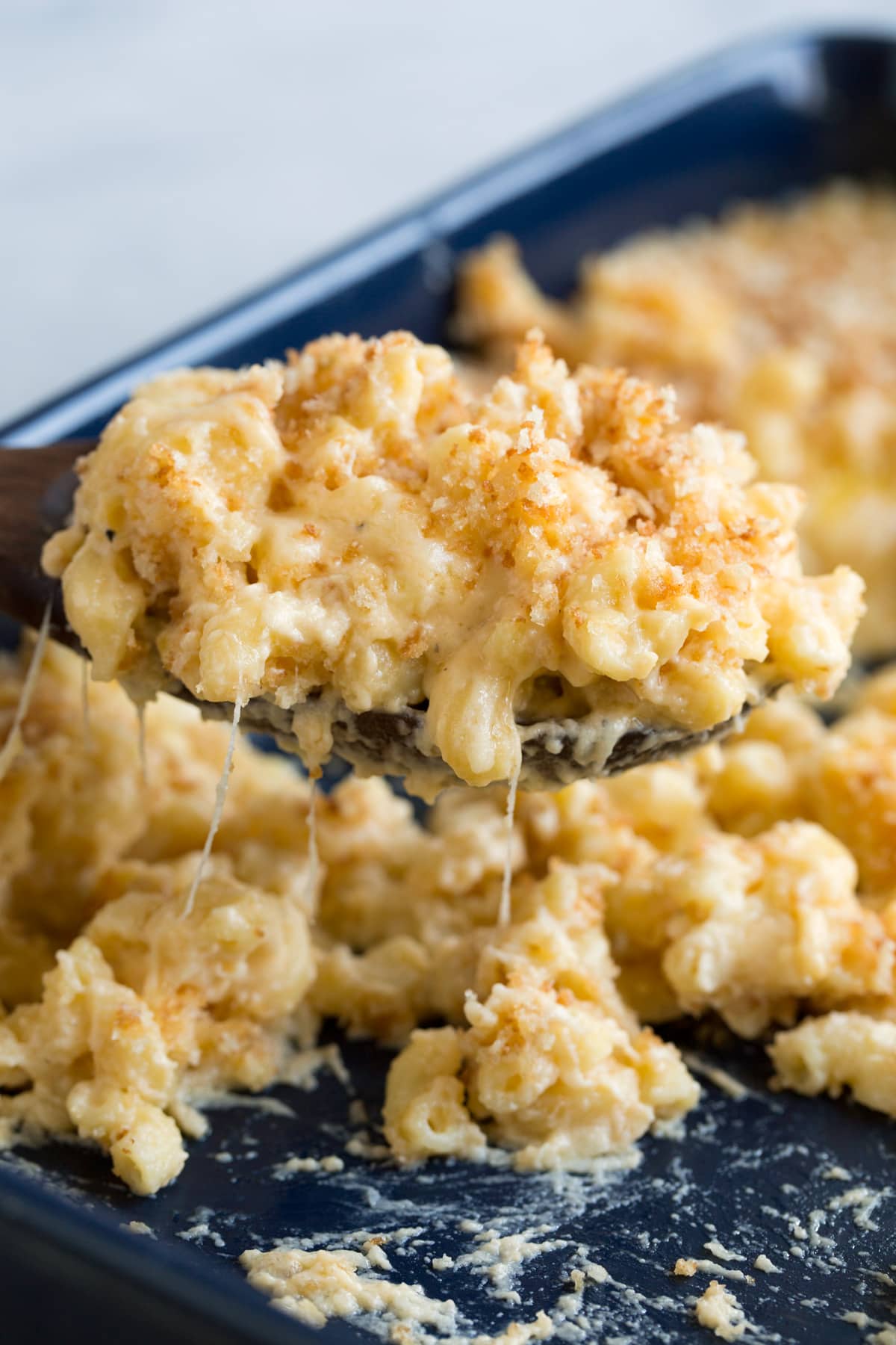 Baked Macaroni and Cheese Scoop full of baked macaroni and cheese.