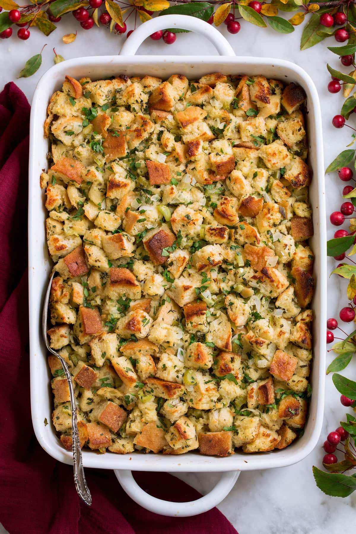 Stuffing in a white casserole dish.
