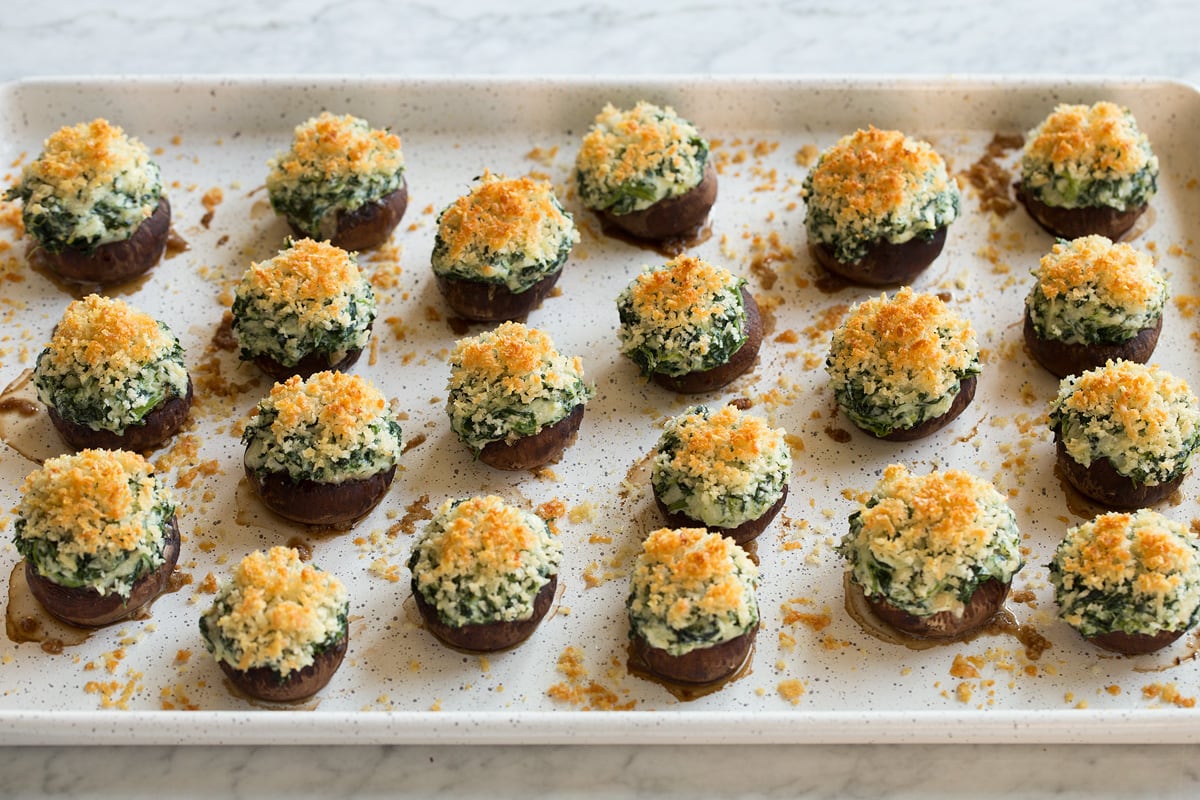 Stuffed Mushrooms Stuffed Mushrooms shown after baking on baking sheet.