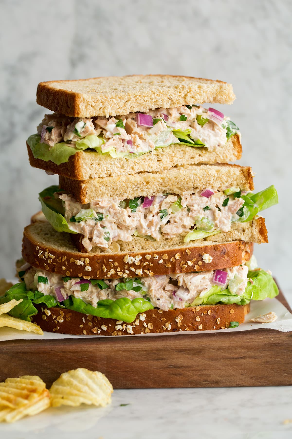 Stack of tuna salad sandwiches.