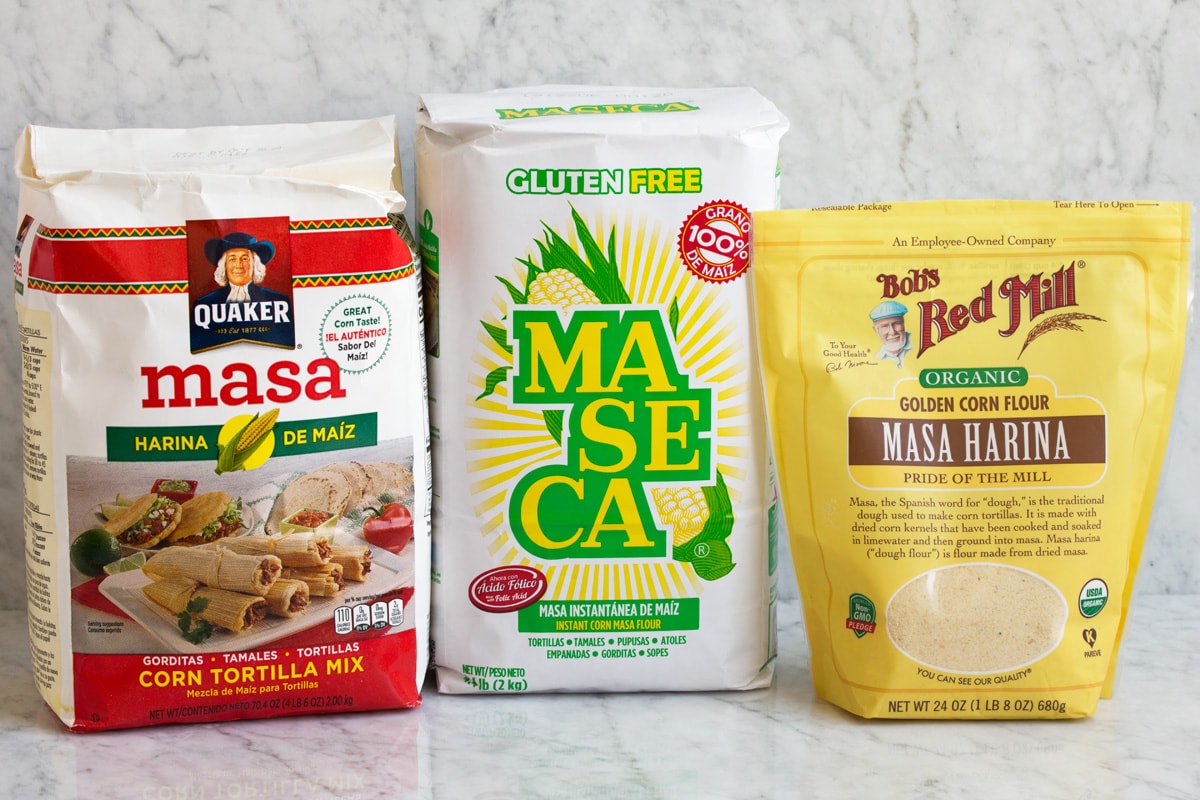 Image of three packages of different brands of masa harina.