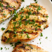 Close up image of grilled creamy garlic dijon chicken.