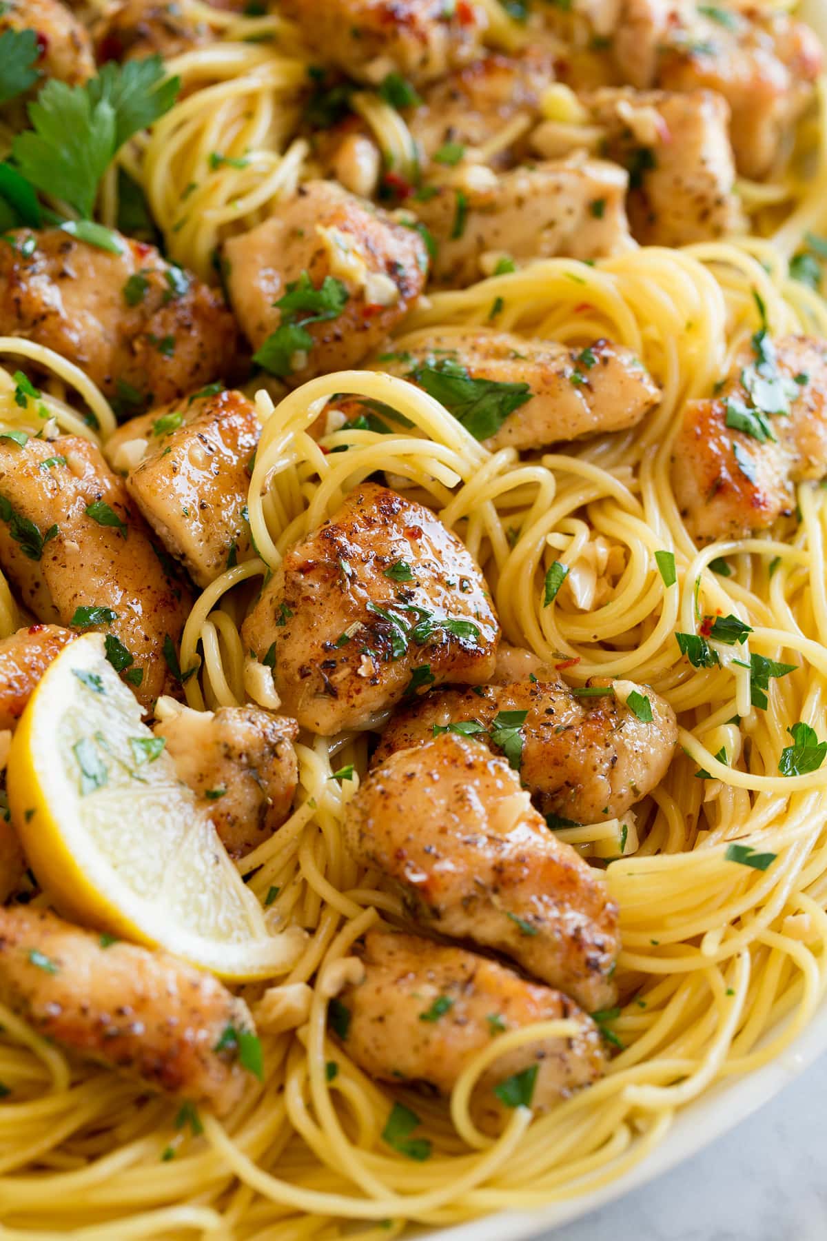 Close up image of chicken scampi and pasta.
