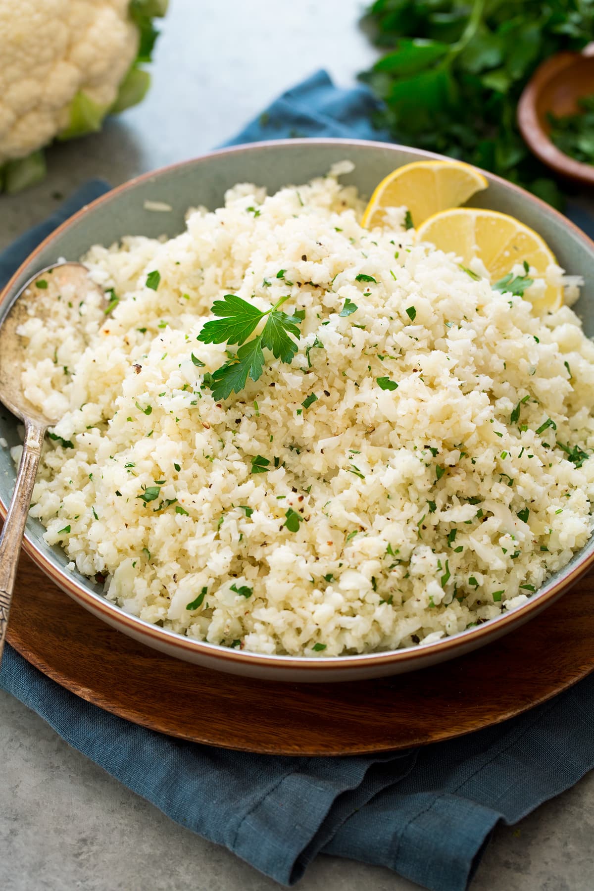 Photo of cauliflower rice shown from the side in a serving bowl.