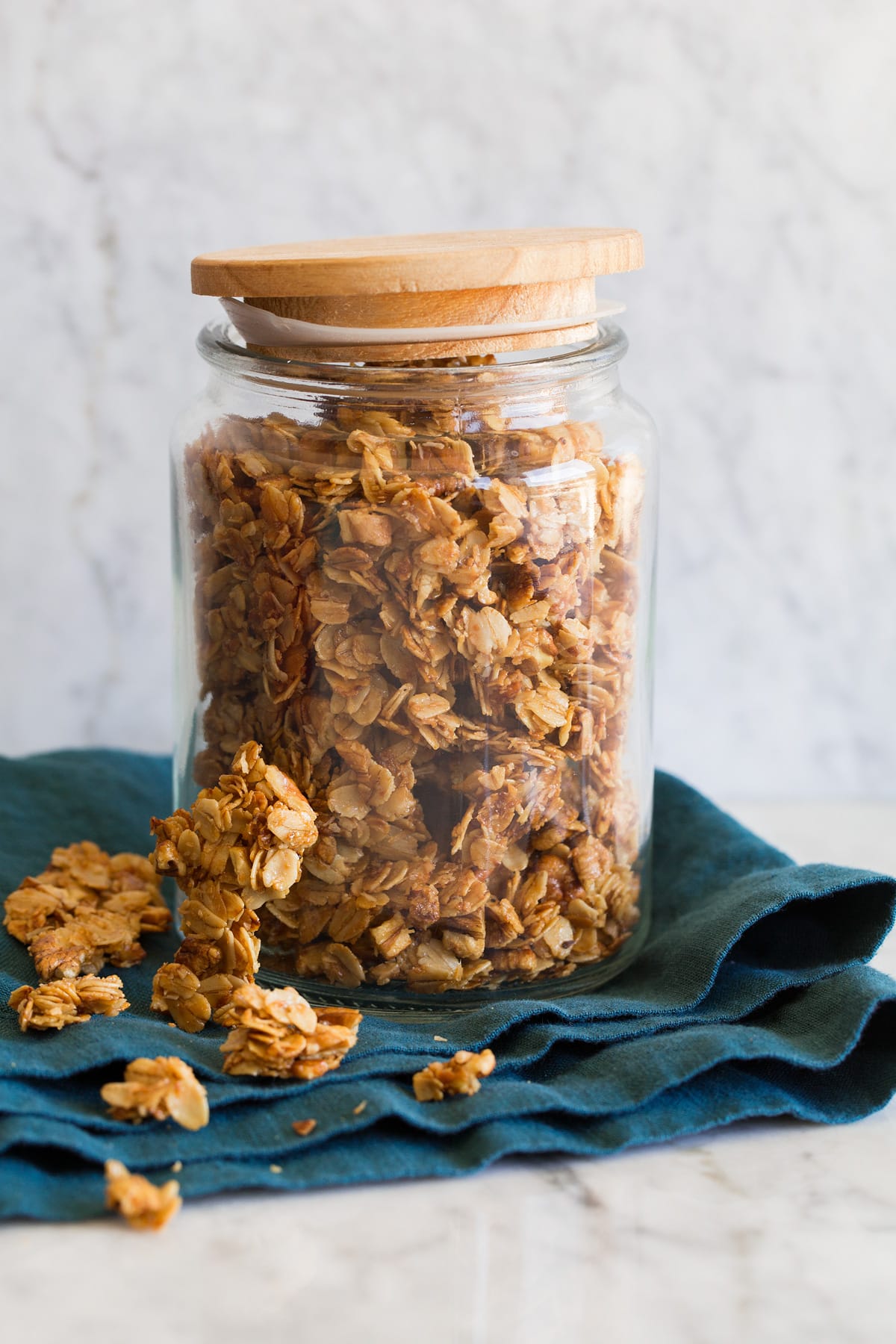 Easy Stovetop Granola Recipe Honey granola shown in a glass jar.