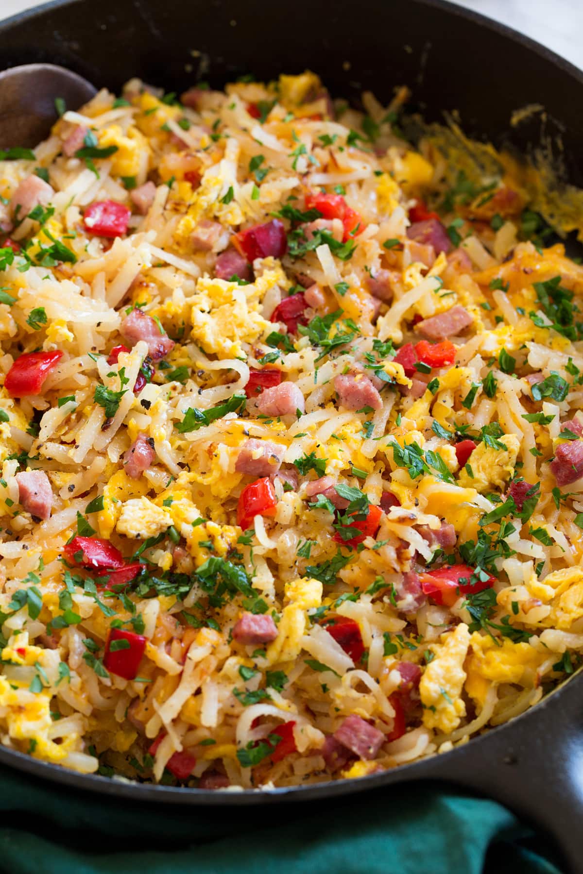 Photo: Breakfast hash shown close up in a cast iron skillet.