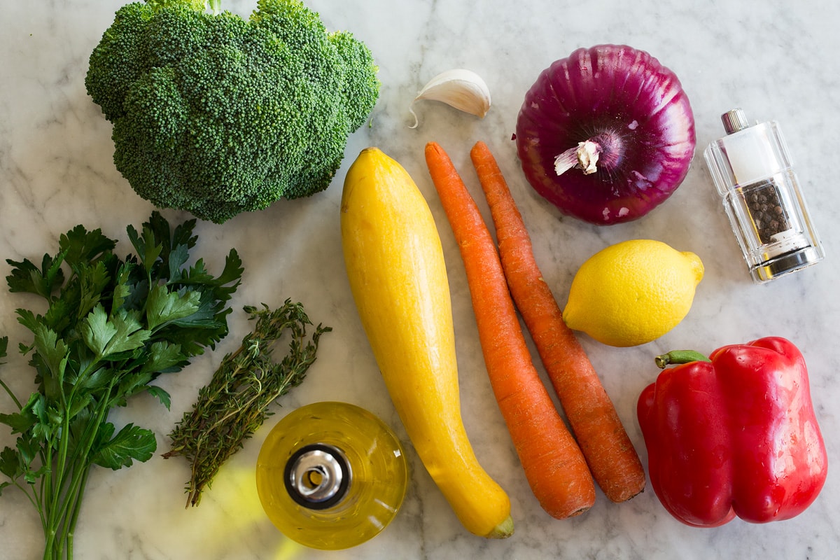 Photo: Ingredients used to make sauteed vegetables shown on a marble countertop.