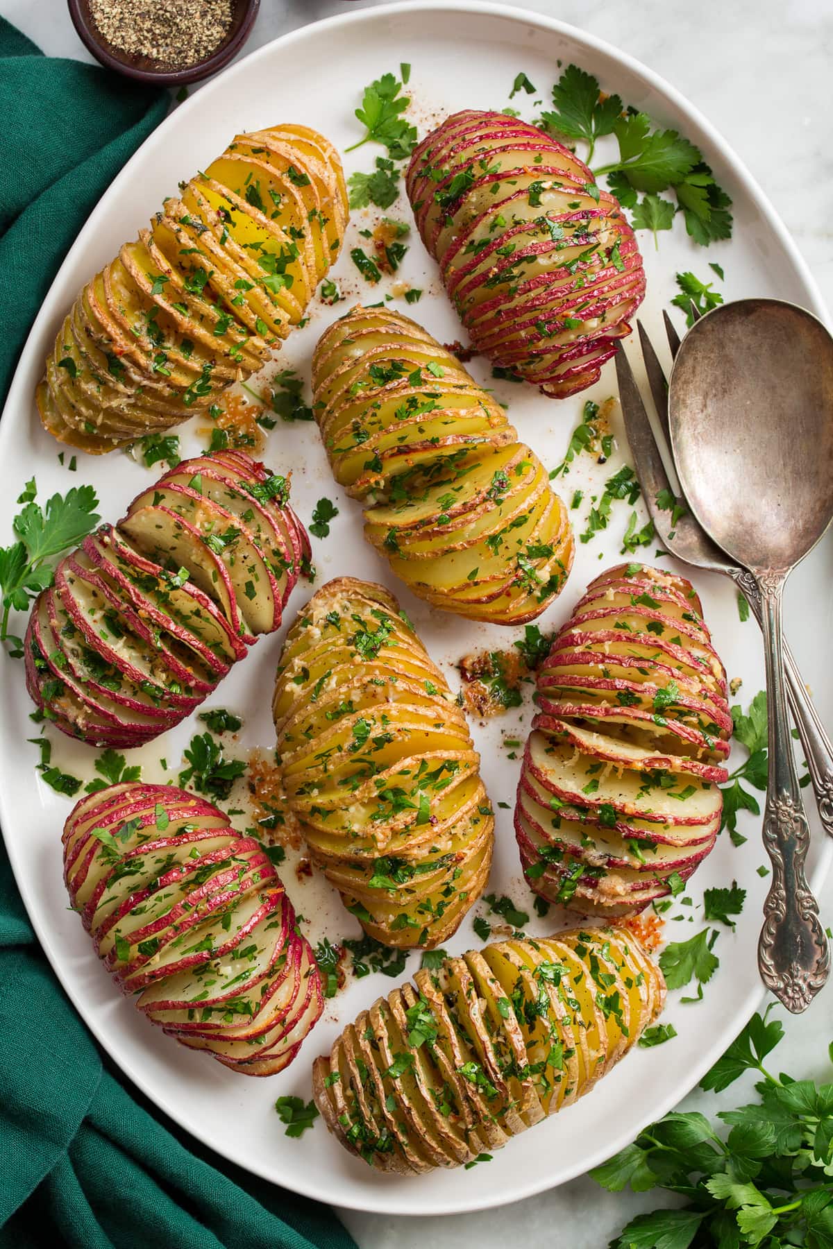 Hasselback Potatoes Close overhead photo of red and yukon gold hasselback potatoes.