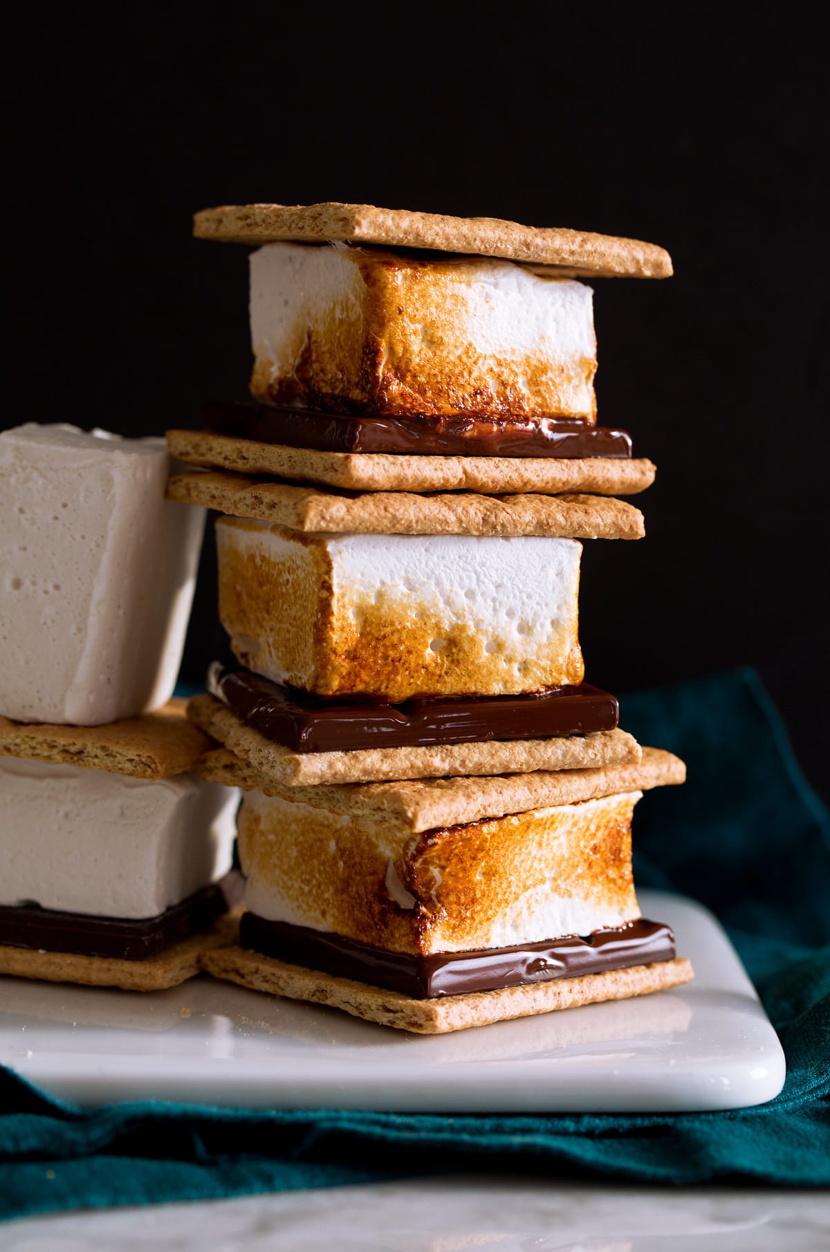 Homemade Marshmallows Stack of s'mores with toasted homemade marshmallows.