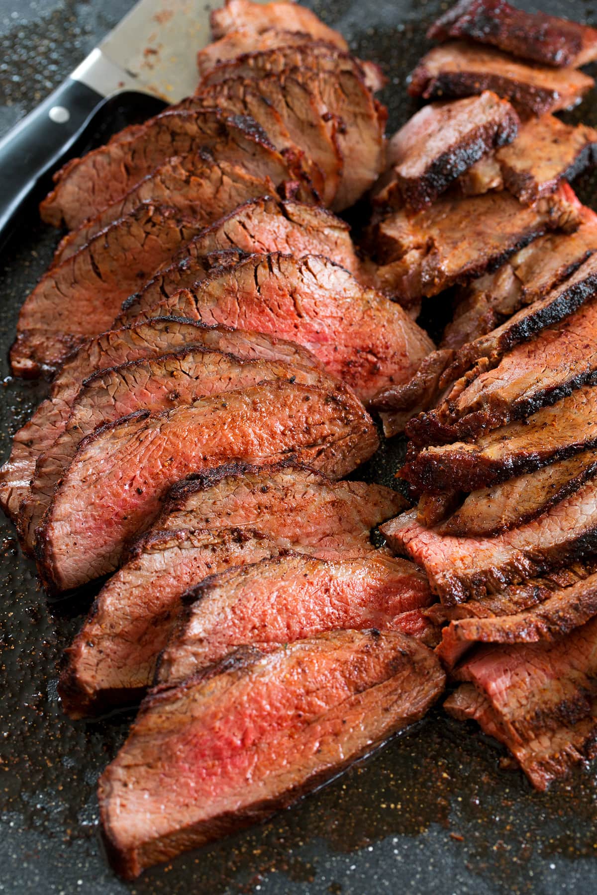 Roasted Tri Tip Close up photo of thinly sliced roasted tri tip.