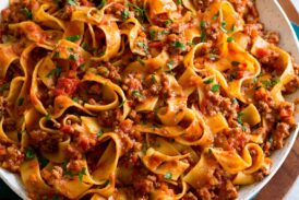 Bolognese sauce tossed with pappardelle pasta.