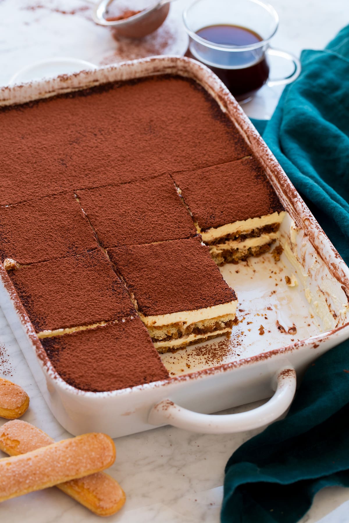 Tiramisu A baking dish filled with tiramisu cut into slices.
