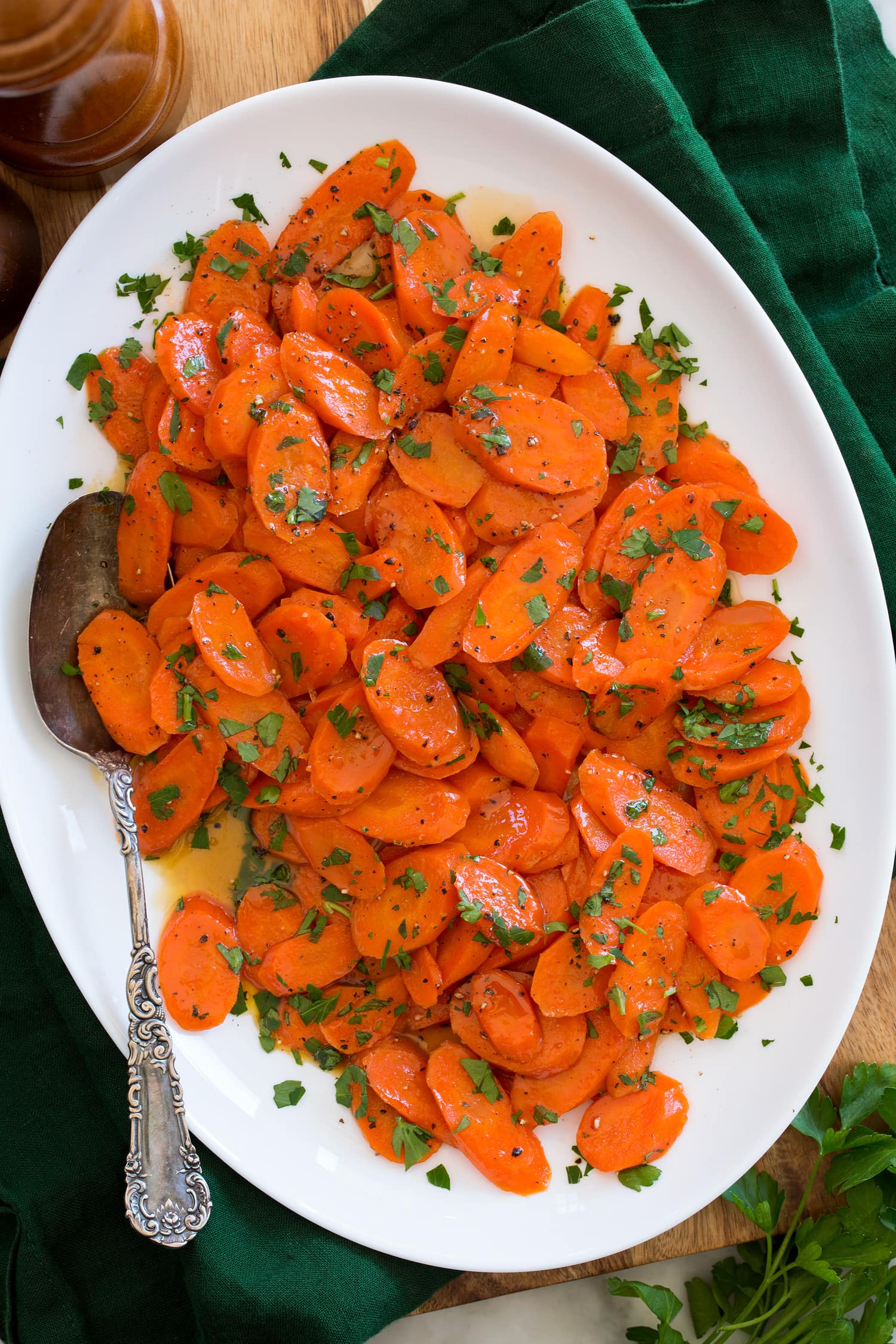 Glazed Carrots Overhead photo of glazed carrots in a white oval serving dish.