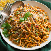 Sun dried tomato pasta with spinach and basil.