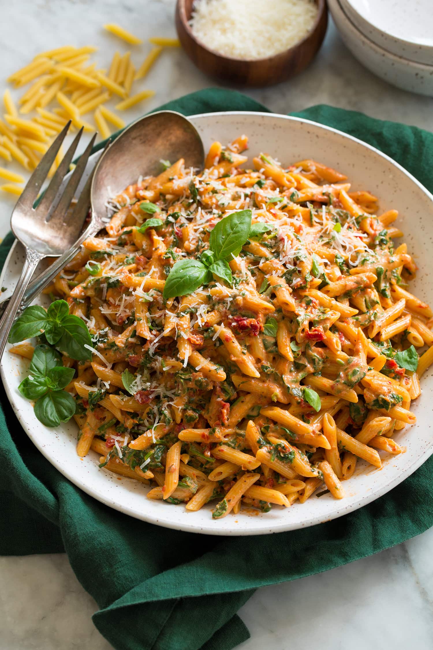 Sun dried tomato pasta with spinach and basil.