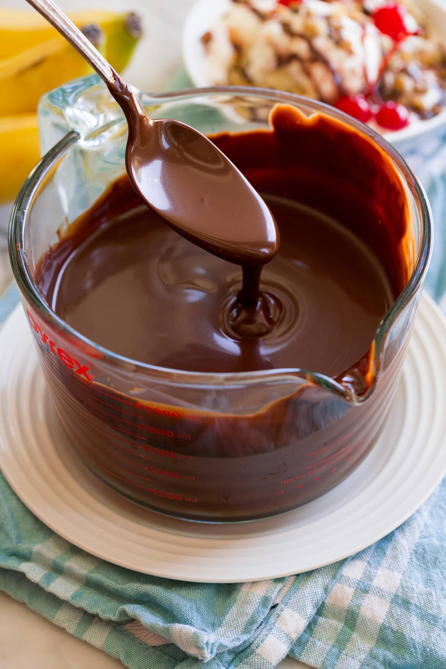 Hot Fudge Sauce Spoonful of chocolate fudge sauce.