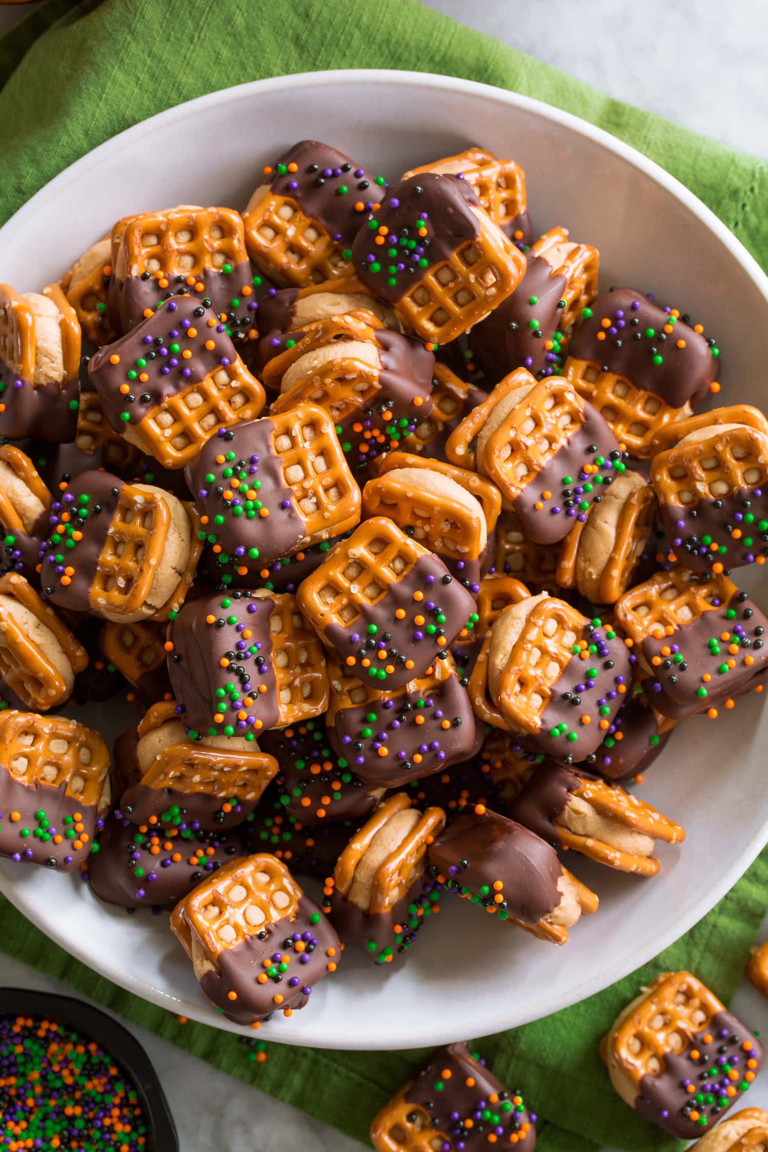 Peanut Butter Pretzel Bites Dark chocolate dipped peanut butter pretzels.