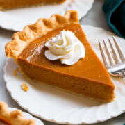 Slice of homemade easy 5 ingredient pumpkin pie.
