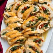 Stuffed chicken breasts with spinach, feta, mozzarella, and sun dried tomatoes.
