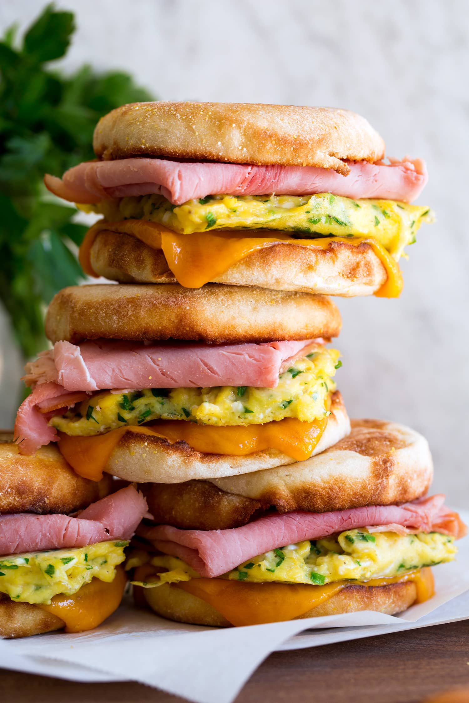 Breakfast Sandwiches Breakfast sandwiches shown in a stack close up.