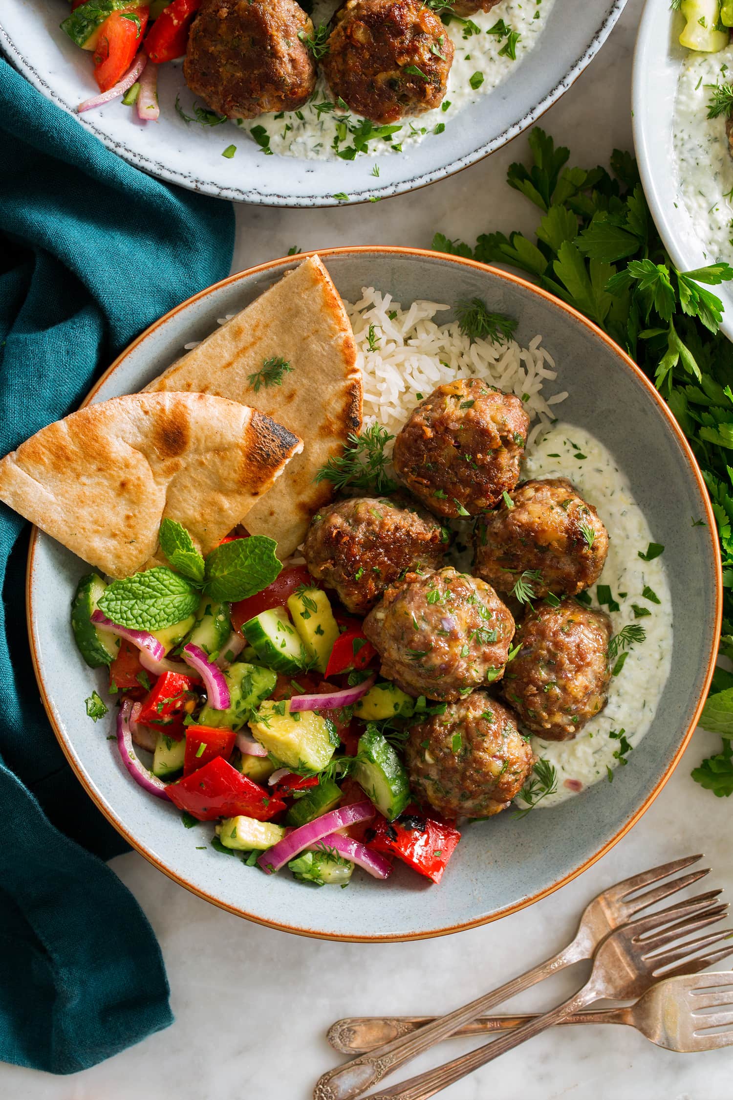 Greek Meatballs Keftedes Greek meatballs in a serving bowl shown from above.