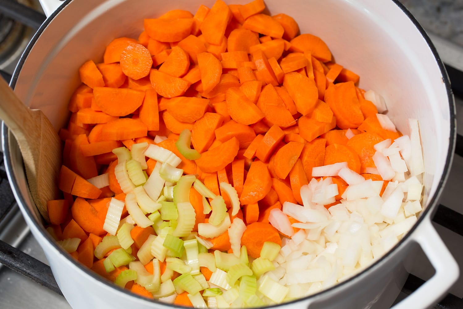 Carrot Soup Carrots, celery and onion sauteing in pot.