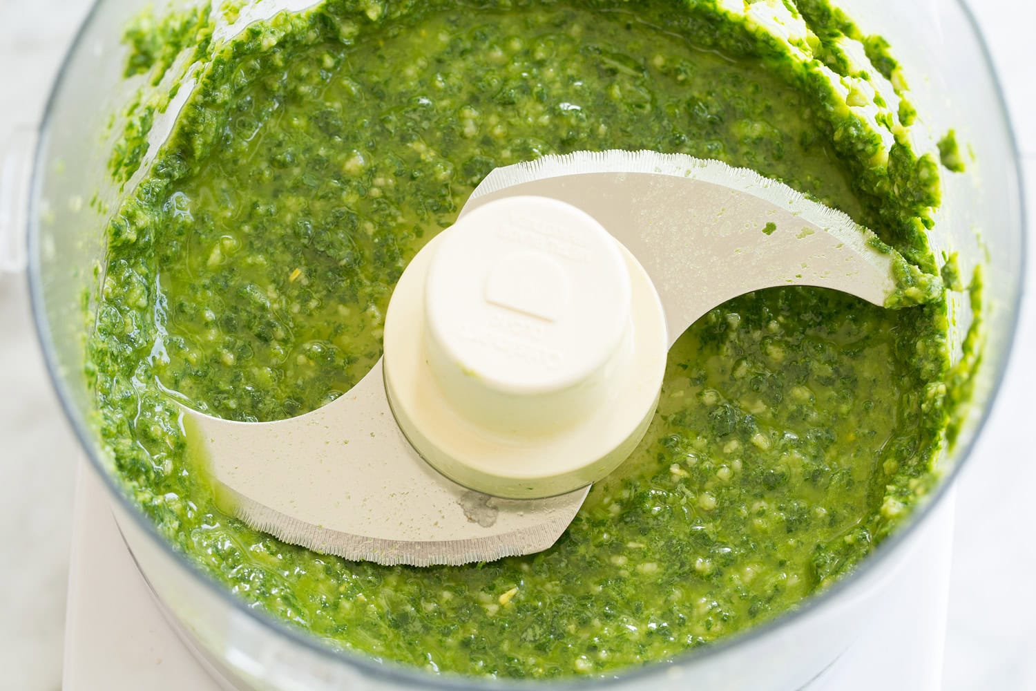 Grilled Chicken Margherita Homemade pesto in a food processor.