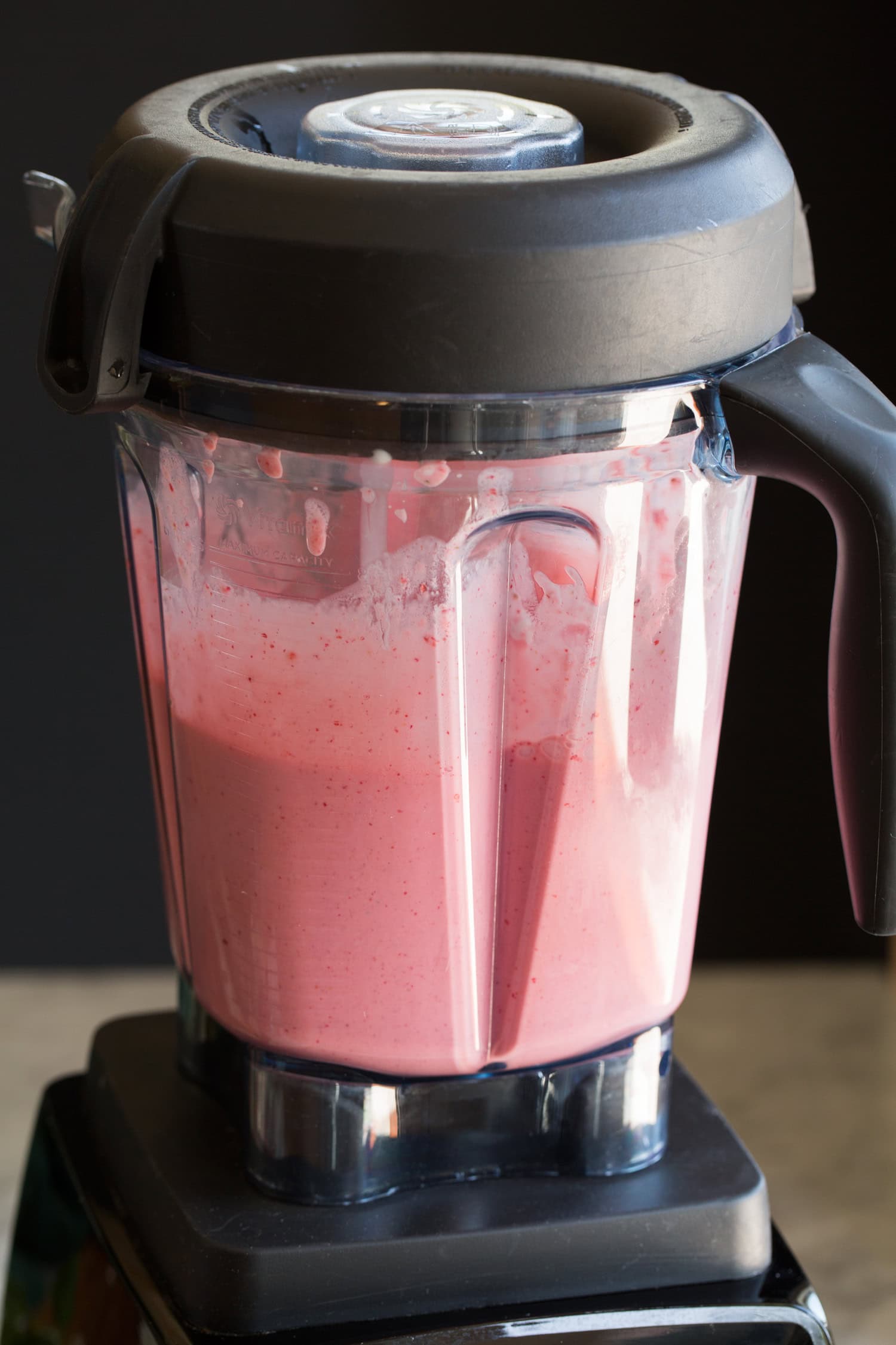 Strawberry Milkshakes Blended strawberry milkshake in a blender.