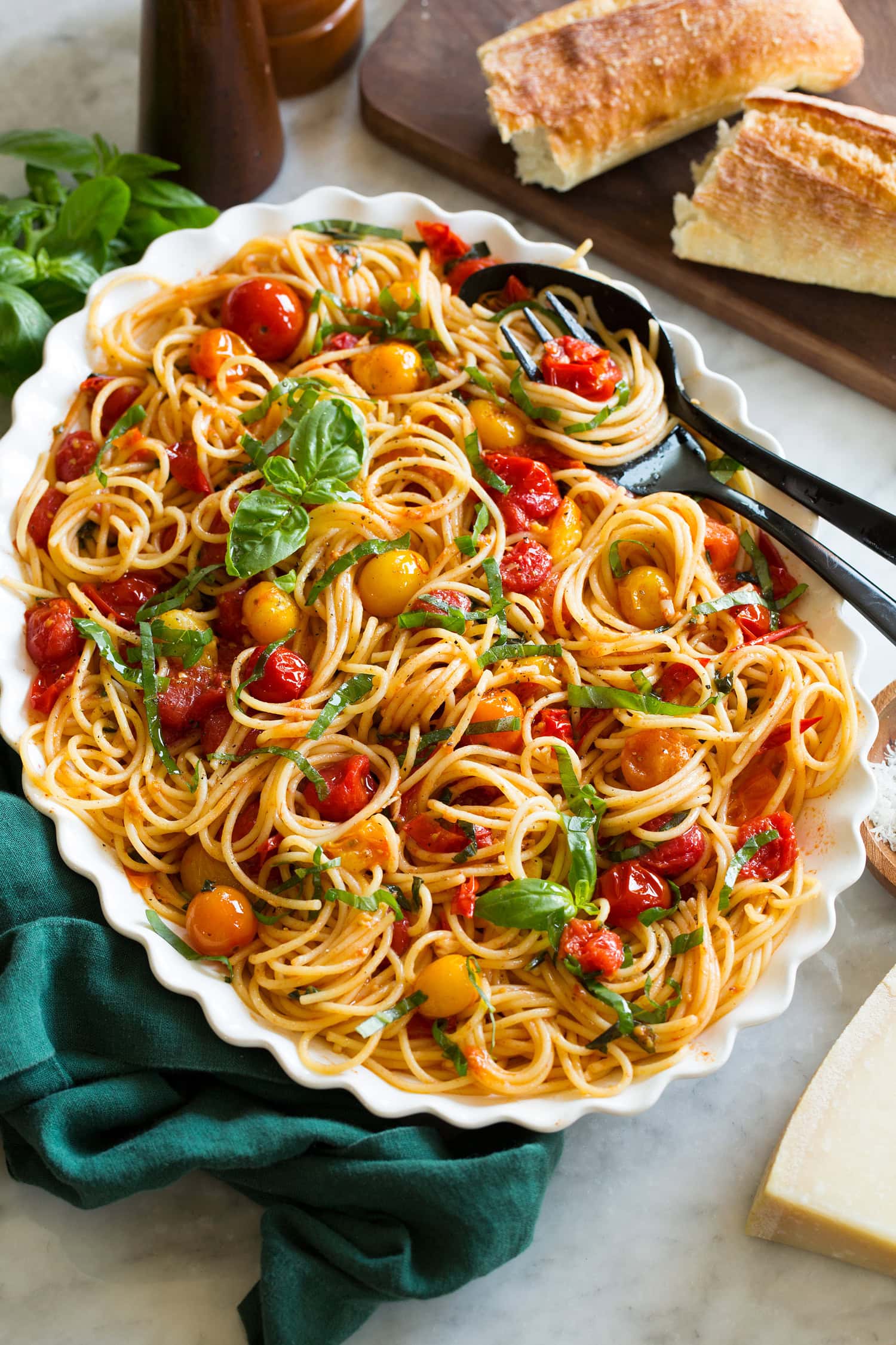 Cherry Tomato Pasta Cherry tomato pasta shown at a side angle on a large serving platter.