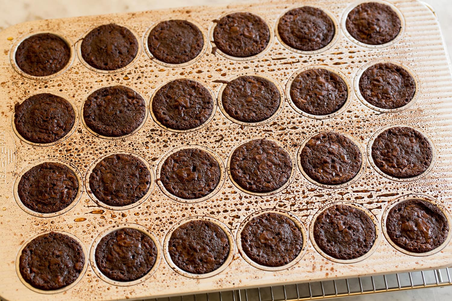 Brownie Bites Brownie bites shown in baking pan after finished baking.