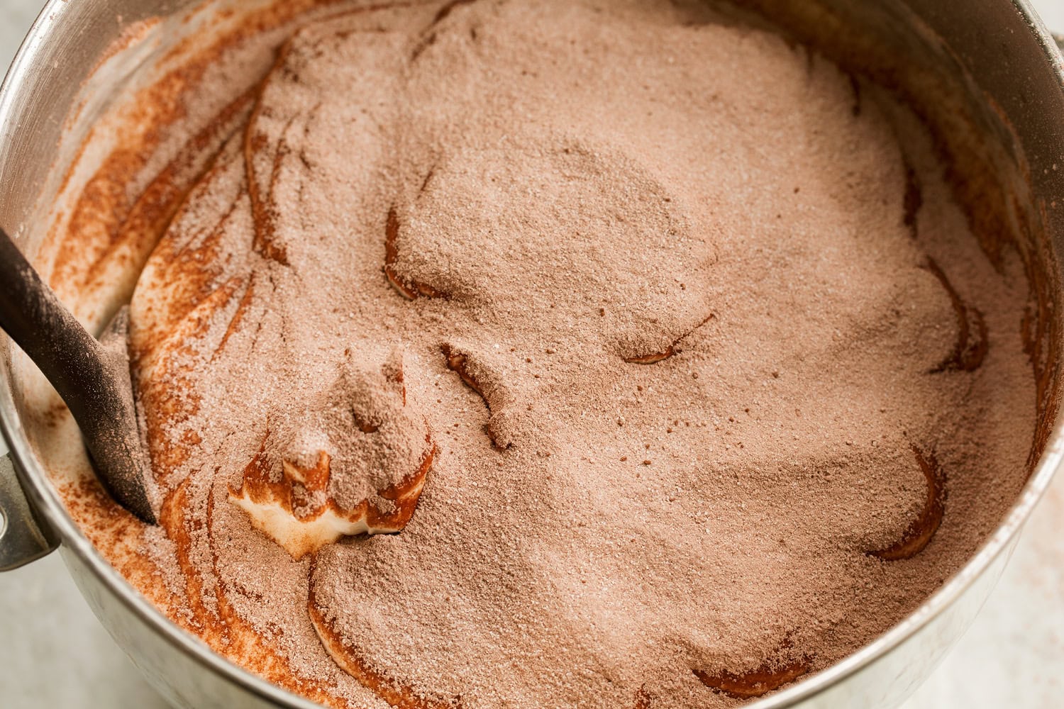 Chocolate Angel Food Cake Flour cocoa mixture dusted over whipped egg white mixture.