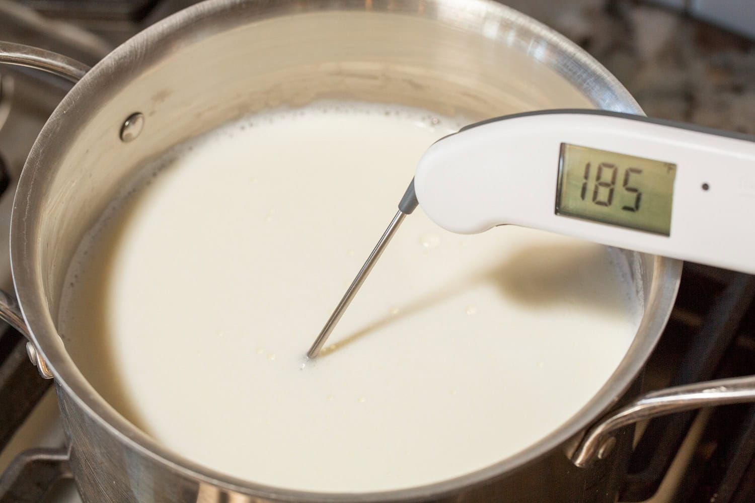 Homemade Yogurt Milk heated in pot to 185 degrees.