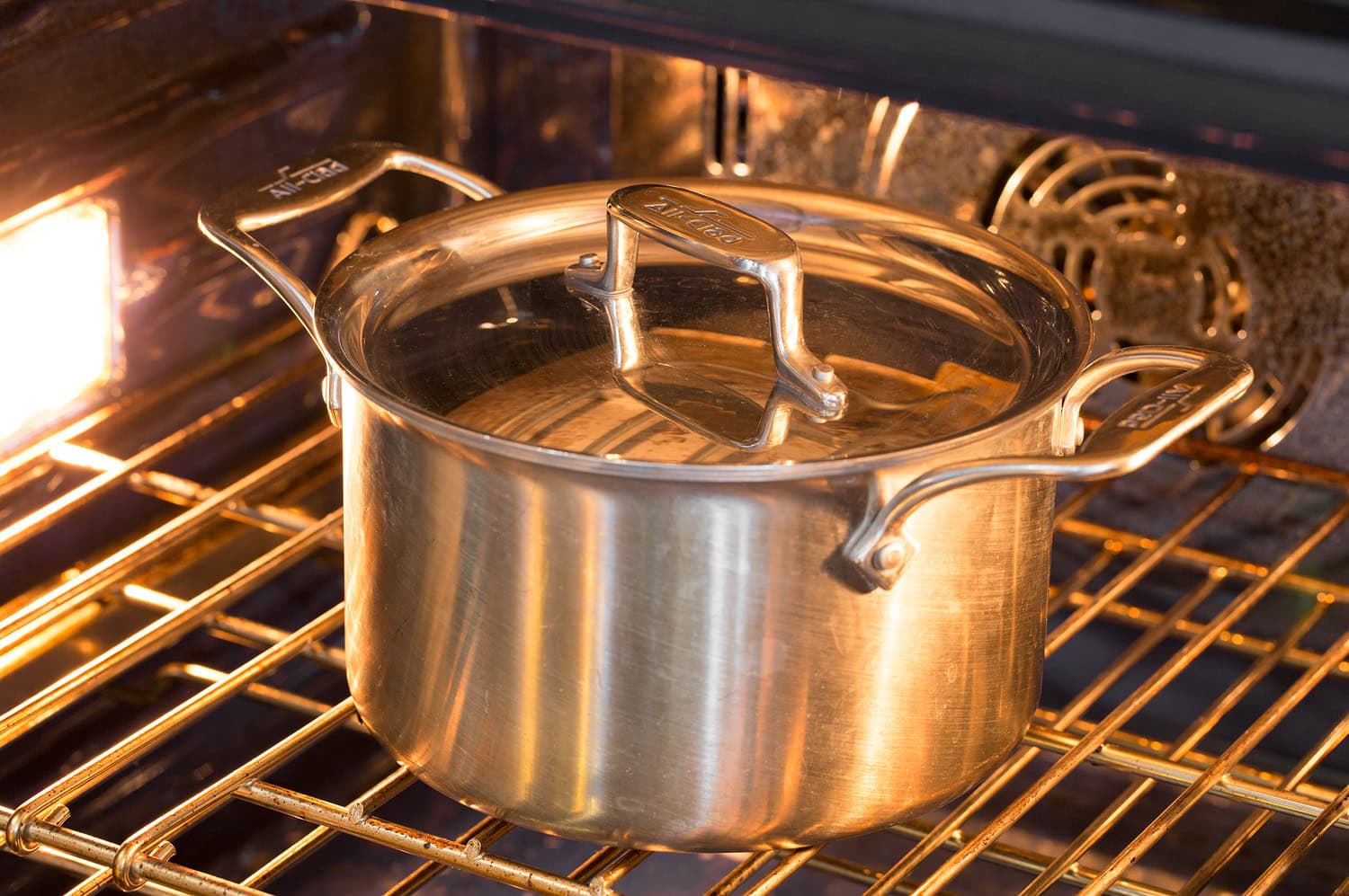Homemade Yogurt Pot in oven with yogurt inside.