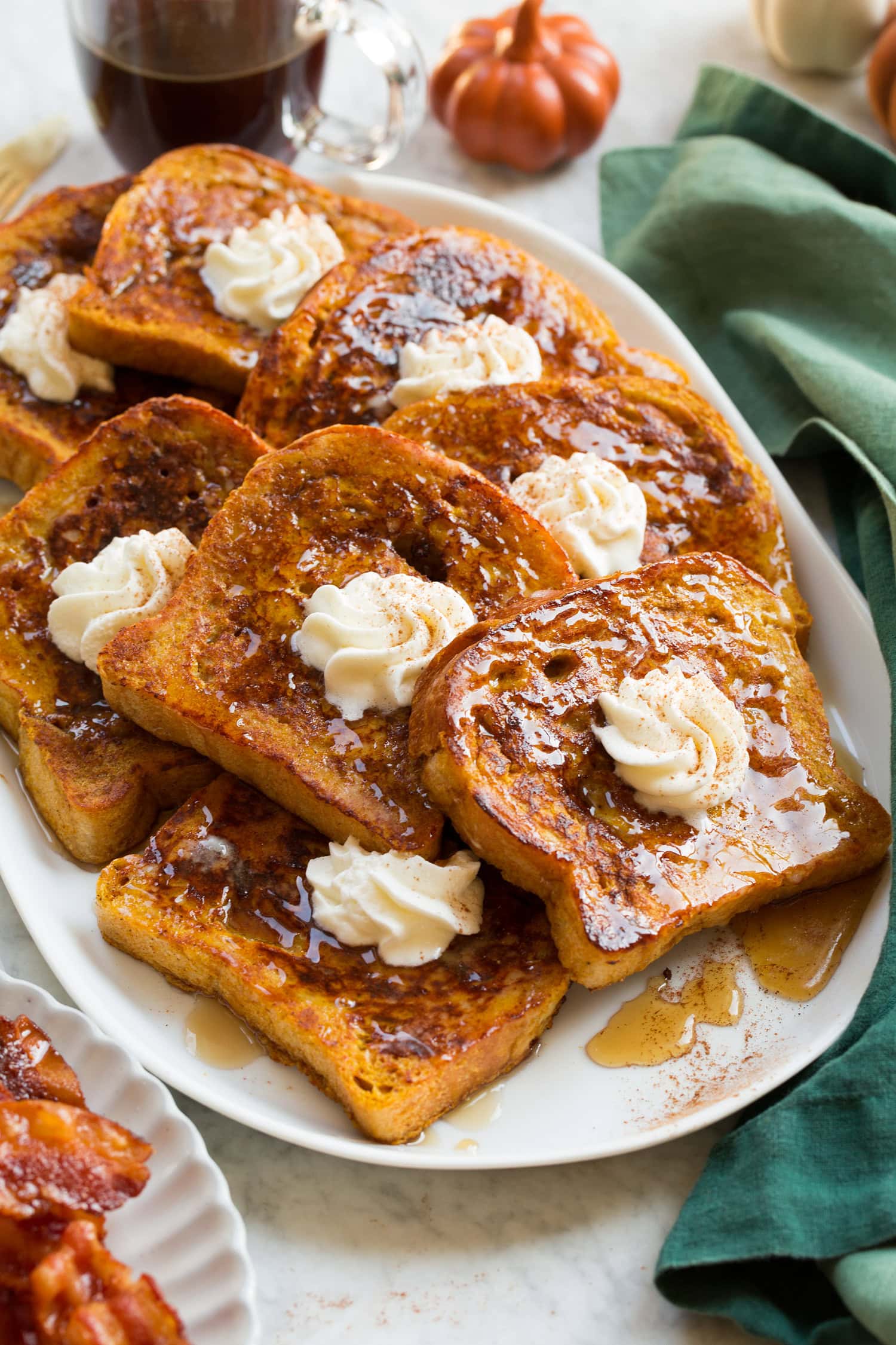 Pumpkin French Toast layered on a platter.