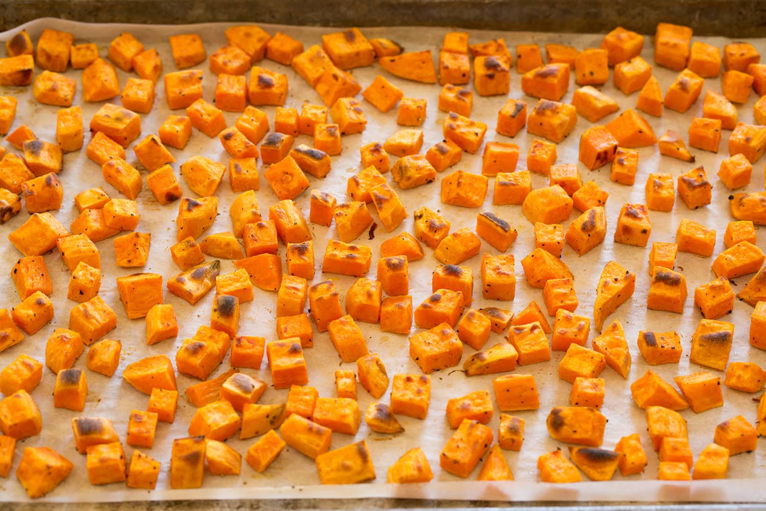 Sweet Potato Salad Roasted sweet potatoes on baking sheet.