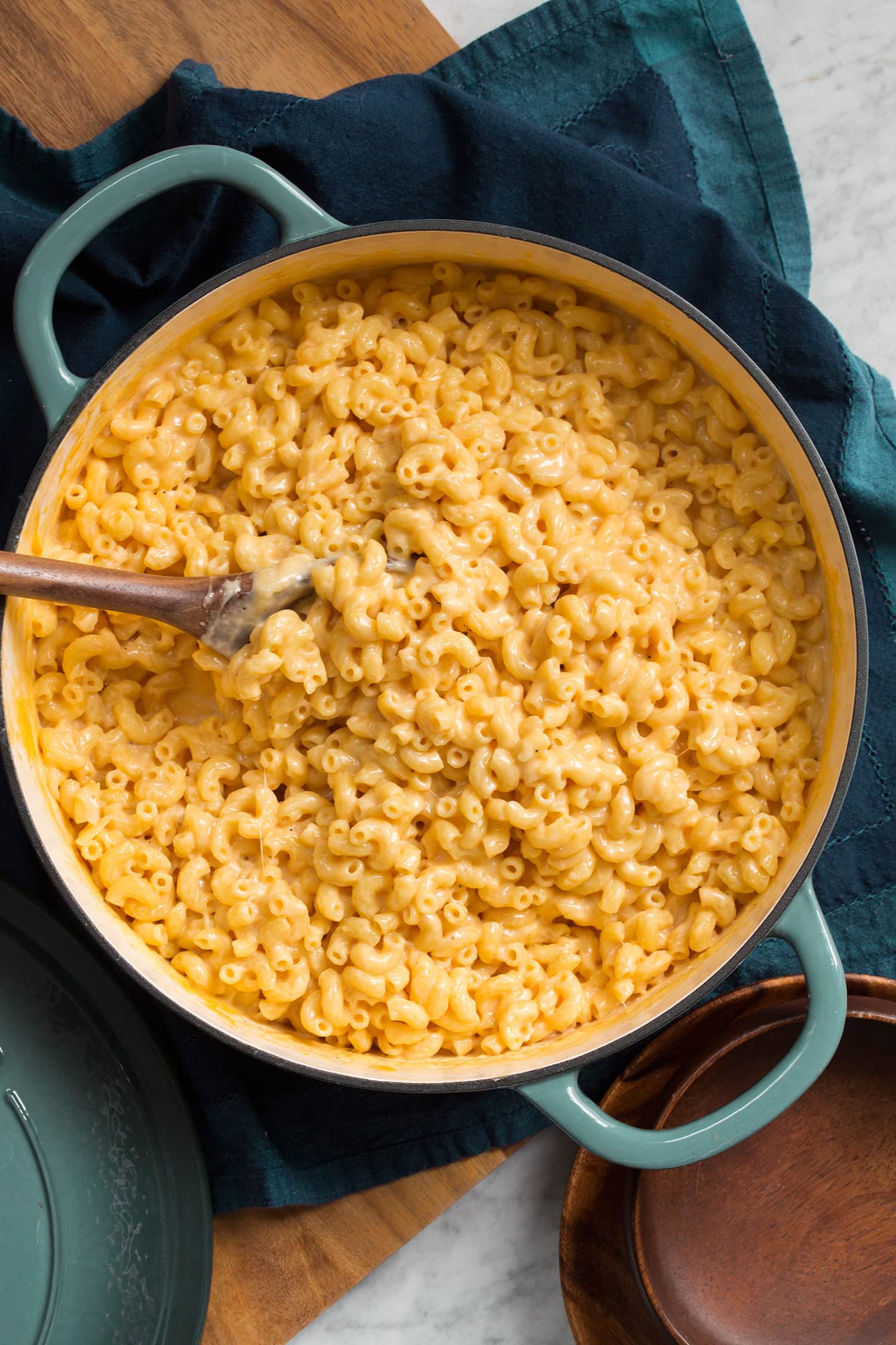Overhead photo of mac and cheese in a blue pot.