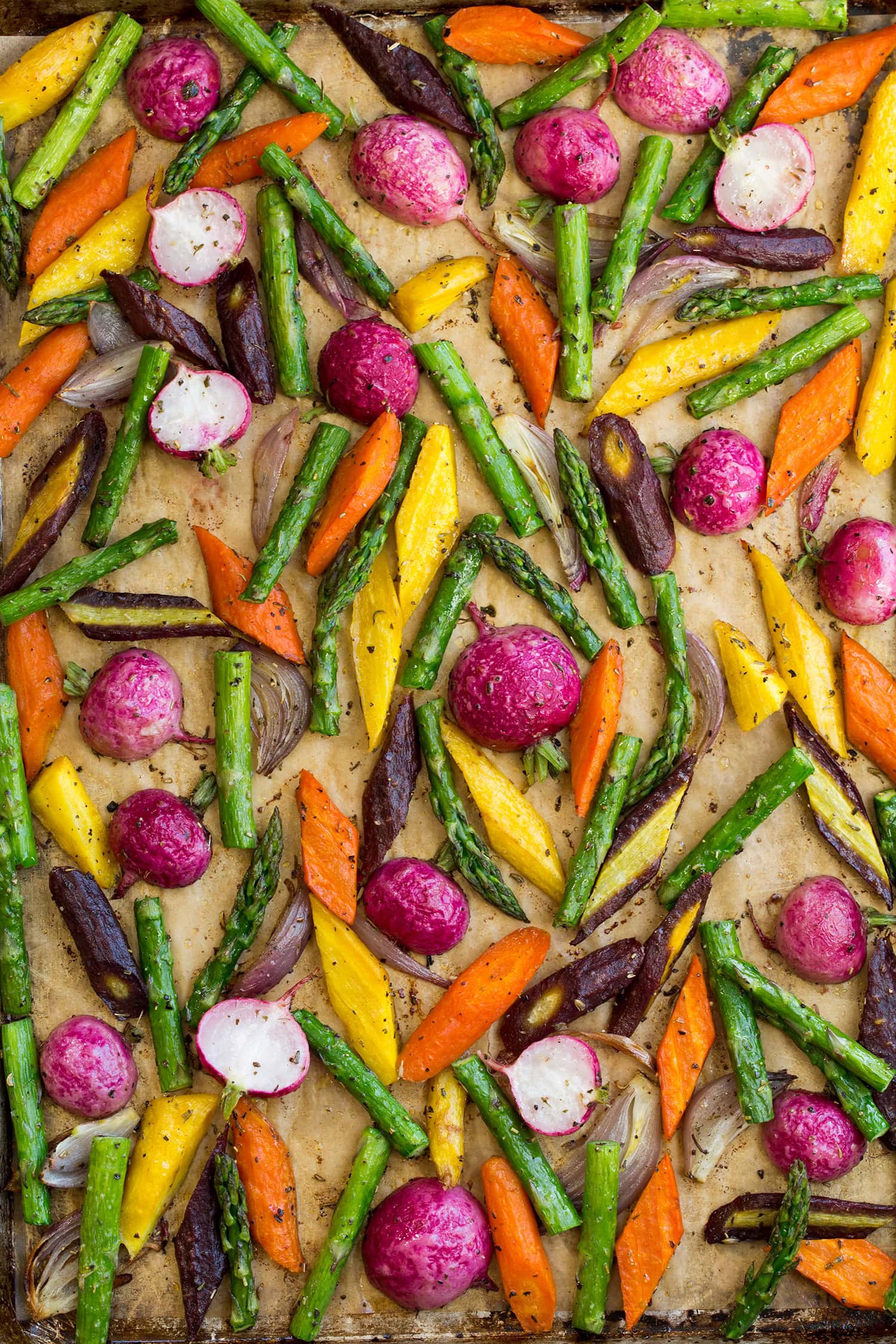 Close up overhead photo of rainbow spring vegetables.