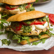 Chicken pesto sandwich on ciabatta bun.