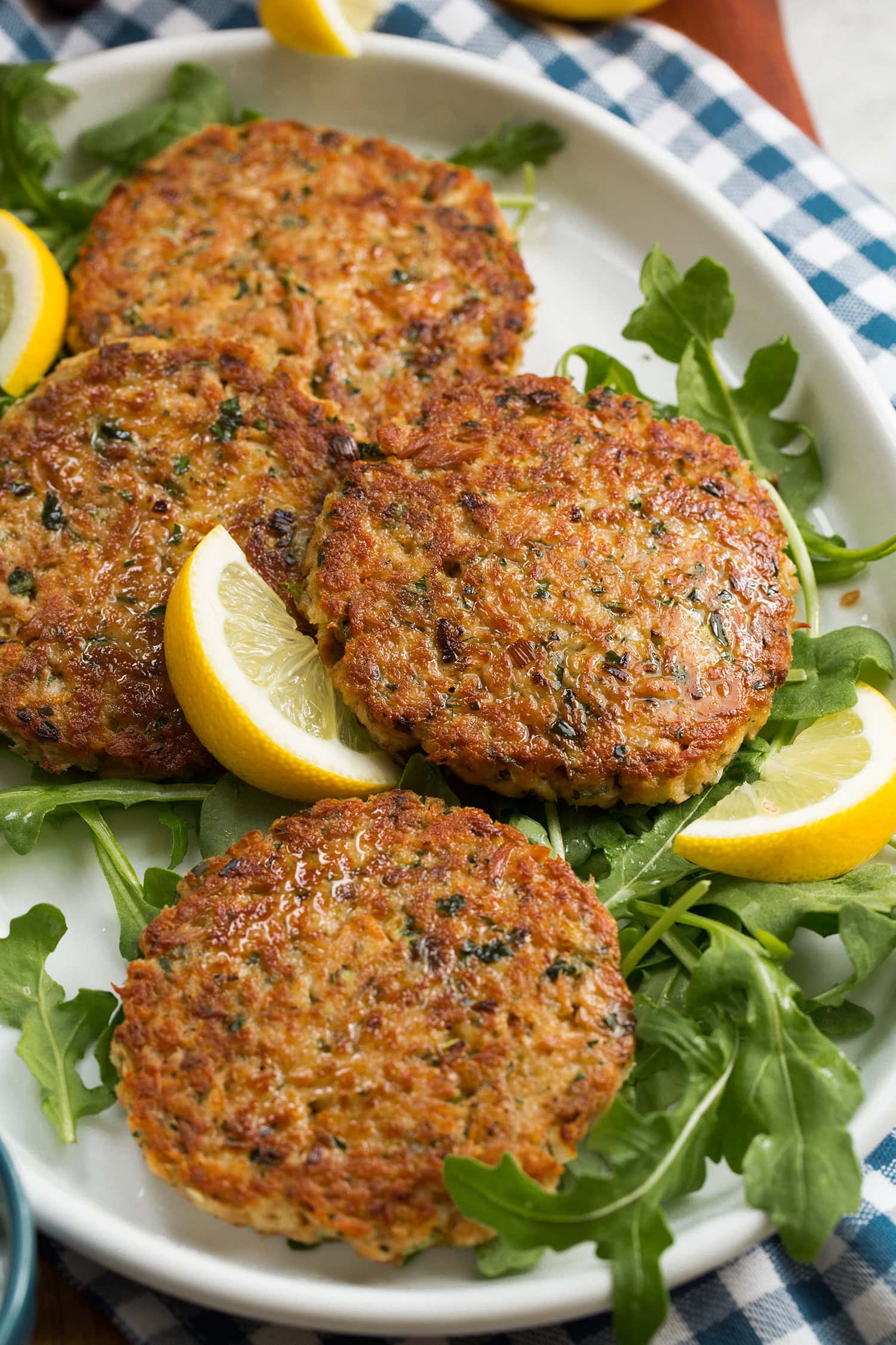 Close up photo of tuna patties on a serving platter.